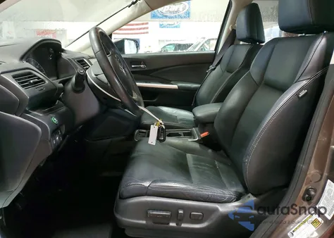 2016 Honda Cr-V Touring z USA, uszkodzony, nr VIN 5J6RM4H96GL087945